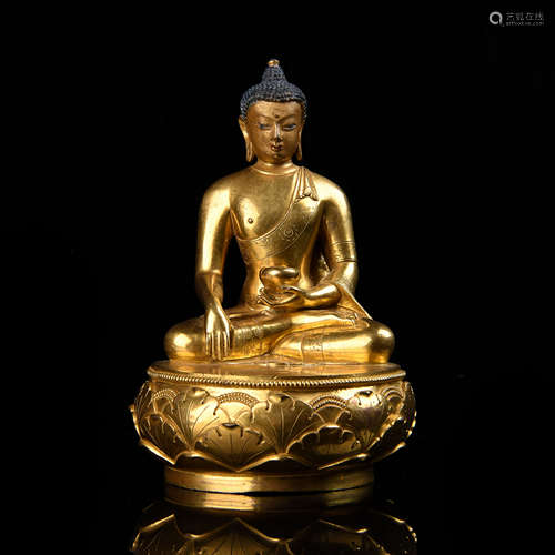 A COPPER-GILDED MEDICINE BUDDHA