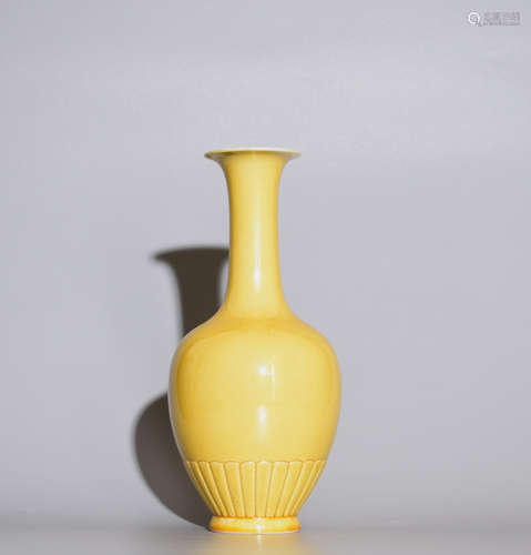 A YELLOW GLAZE BOTTLE