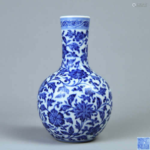 A BLUE AND WHITE CELESTIAL BOTTLE PAINTED WITH TWINNING LOTUS