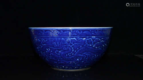 A CHINESE BLUE-GLAZED BOWL CARVED WITH DRAGON PATTERN