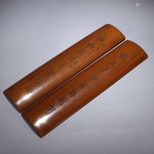 A CHINESE BAMBOO WRISTREST CARVED WITH POEM DESIGN