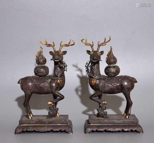 A PAIR OF ORNAMENTS SHAPED WITH SILVER DEER