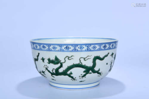 A CHINESE BLUE AND WHITE DRAGON PATTERN CARVED PORCELAIN BOWL