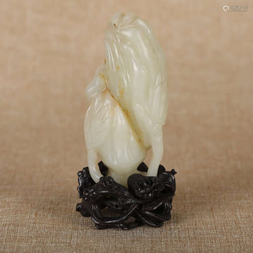 A CHINESE HETIAN JADE CARVED BUDDHA'S HAND ORNAMENT