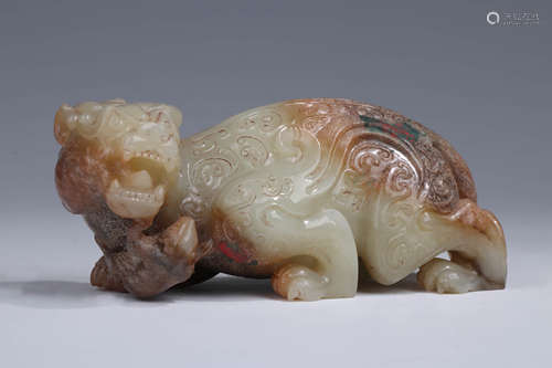 A CHINESE JADE CARVED BEAST ORNAMENT