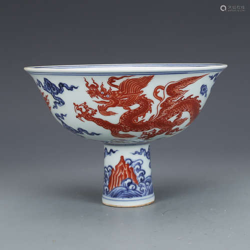 A CHINESE BLUE AND WHITE IRON RED DRAGON PATTERN PORCELAIN STANDING BOWL