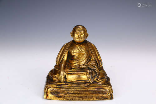 A Chinese Bronze Gilding Sitting Buddha Statue