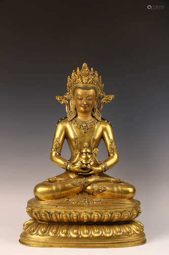 A Chinese Bronze Gilding Sitting Buddha Statue