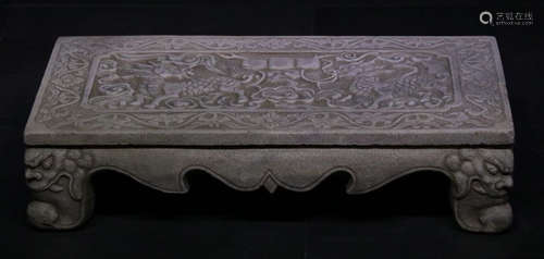 A HANBAI STONE TABLE CARVED WITH BEAST