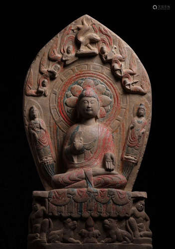 A STONE BUDDHA STATUE