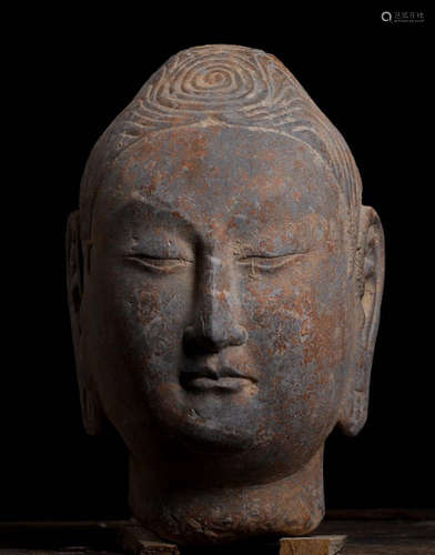 A STONE BUDDHA HEAD