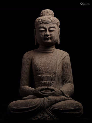 A STONE BUDDHA STATUE