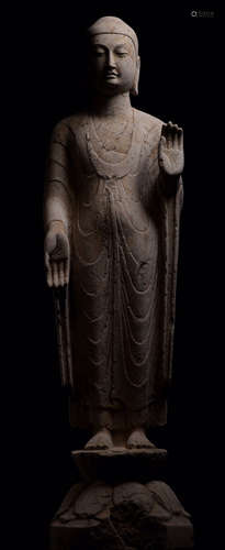 A STONE BUDDHA STATUE