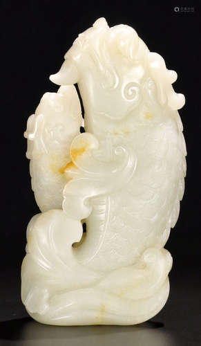 A HETIAN JADE ORNAMENT SHAPED WITH FISH