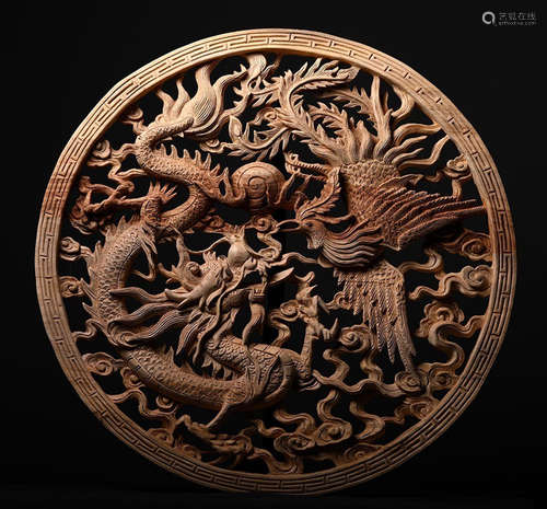 A XIANGZHANG WOOD ORNAMENT CARVED WITH DRAGON