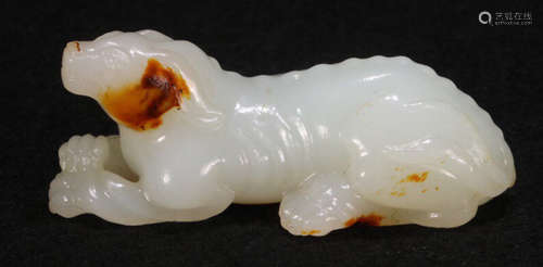 A HETIAN JADE DOG PENDANT