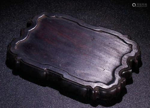 A ZITAN WOOD INK SLAB CARVED WITH BEAST