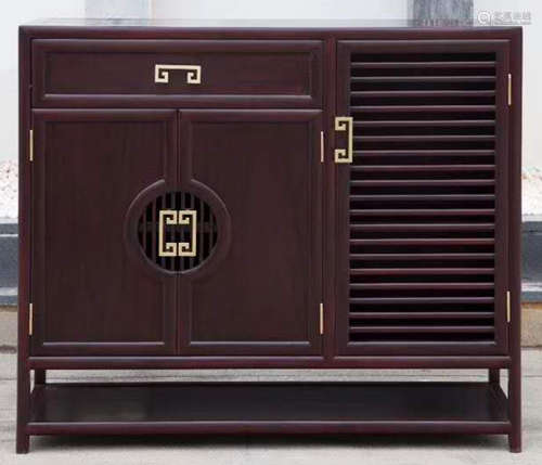 A ZITAN WOOD CABINET WITH DRAWERS