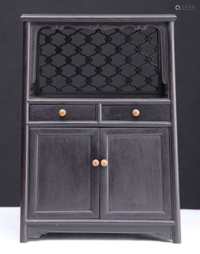 A ZITAN WOOD CABINET CARVED WITH PATTERN