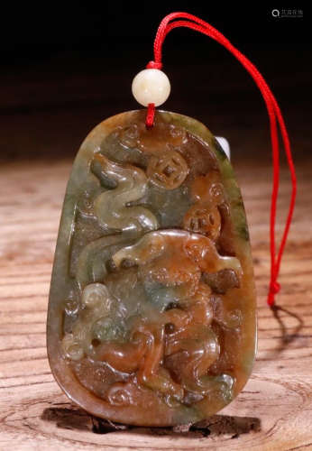 AN OLD JADEITE TABLET CARVED WITH BEAST