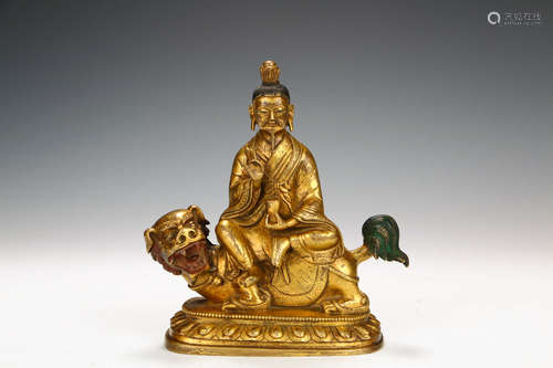 A Chinese Bronze Gilding Sitting Buddha Statue