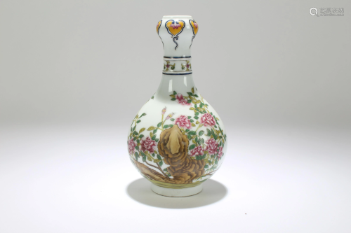A Chinese Porcelain Vase in Fencai Polychrome Enamels