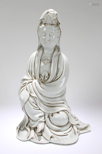 A Porcelain Guanyin Statue