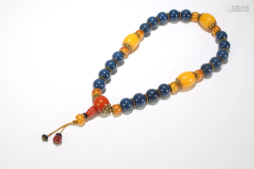 A blue and Yellow Bead Charm