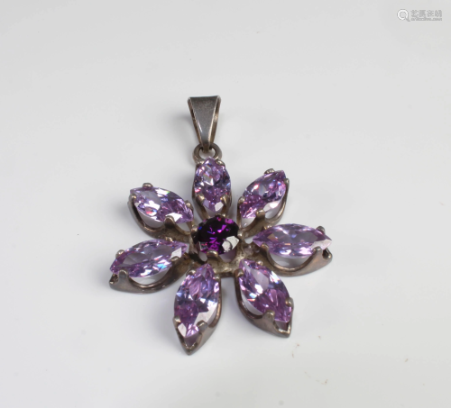 A Petal Shaped Pendant with Crystal Inlay