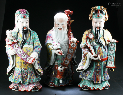 A Group of Three Porcelain Immortal Statues