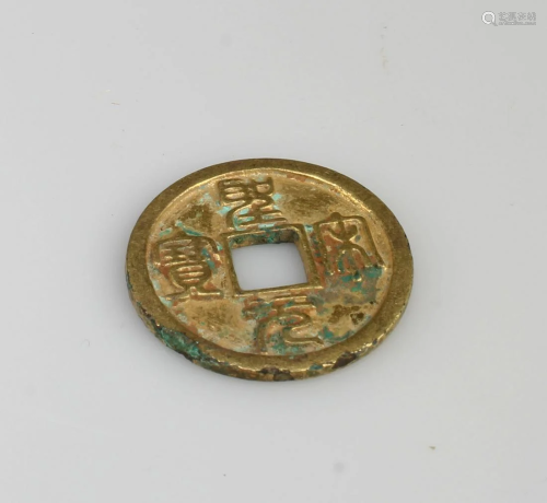 A Gilt Copper Coin