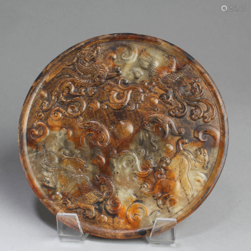 A Round Jadestone Ornament