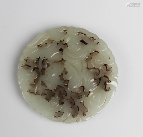 A Round Carved Jade Ornament