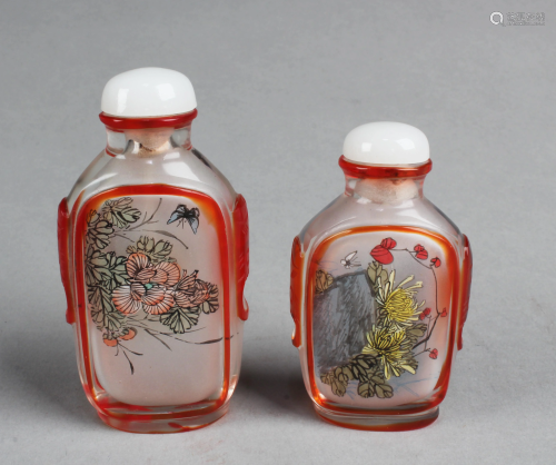 A Group of Two Peking Glass Snuff Bottles
