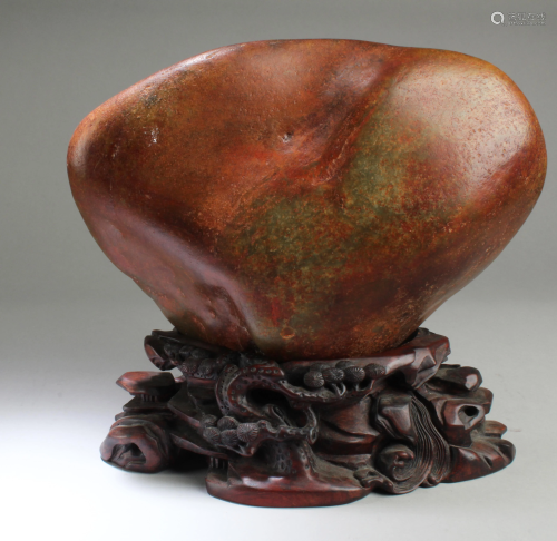 Chinese Hetian Jade Boulder with Wooden Stand