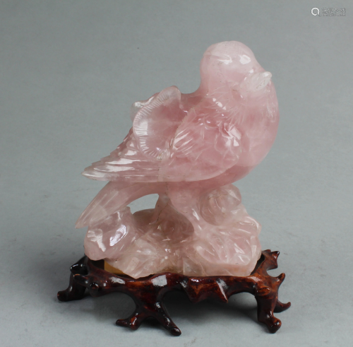 A Carved Lavender Crystal Bird Figurine