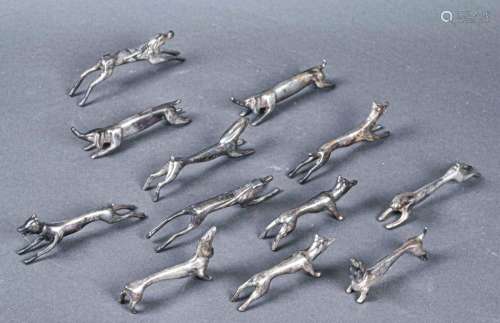 Douze porte couteaux en métal argenté représentant…