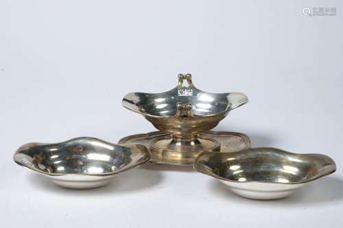 A gravy boat and two armoured containers in silver…