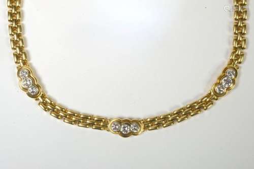 18 karat yellow gold necklace set with brilliant c…