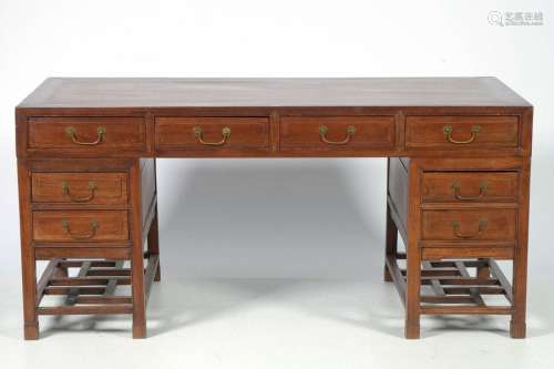 Flat desk with carved exotic wood pedestals openin…