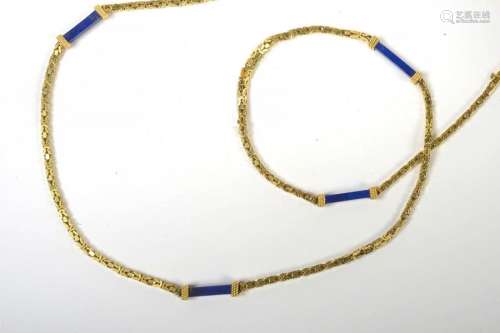 Long necklace in 18 karat yellow gold set with lap…