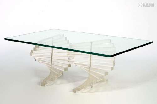 Rectangular coffee table with a plexiglass base to…