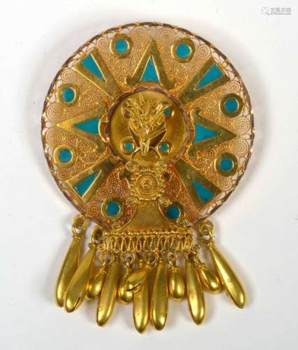 Brooch in 14 carat yellow gold with the head of \