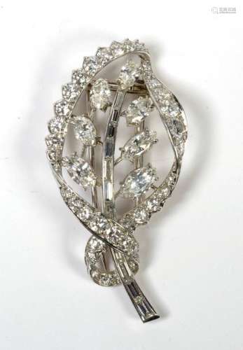 Leaf shaped platinum brooch set with brilliant cut…