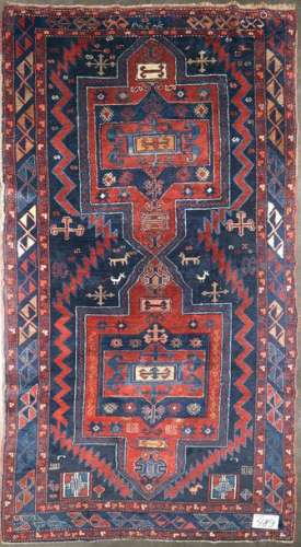 Large handmade woollen Kazak rug decorated with tw…