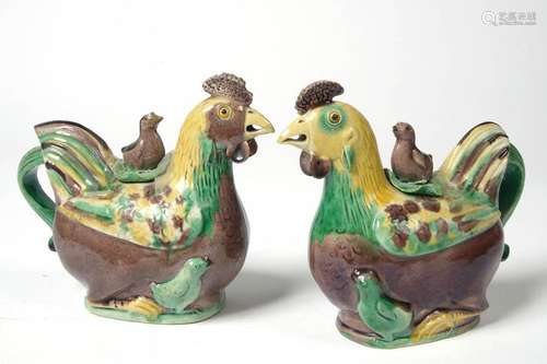 Pair of small pourers in the shape of \