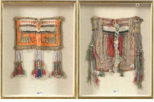 Two masks of Bedouin women in beading and fabric, …