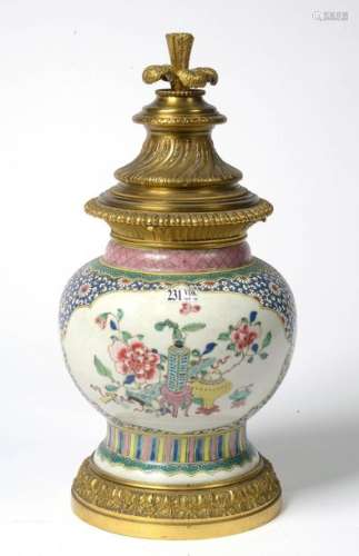 A Napoleon III style gilt bronze vase in polychrom…