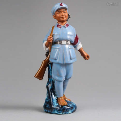 A Chinese Porcelain Soldier Statue