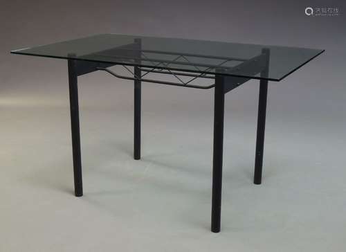 A Contemporary glass and black anodised steel dining table, with rectangular glass top, on